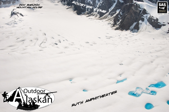 The pretty blue pools atop the glaciers as seen here on the Ruth Amphitheater are spots where the glaciers are melting. These pools or water retain more heat than the glaciers thus expediting the process. Don Sheldon mountain house sits on the knoll in the