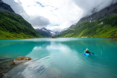 Packrafting down the lake in the middle of the tour.