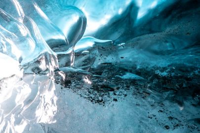 Looking at the clear glacier ice.