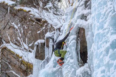 Doing the reach on a guided Valdez ice climbing tour.