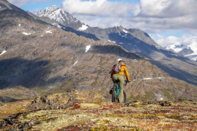 Riding the alpine with fall colors and fresh powdery peaks.