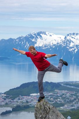 Balancing on a rock above Valdez, playing and taking in the views.