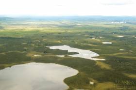 Mew Lake with Black Hills in the distance.