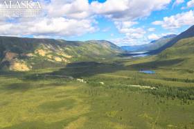 Down Braye Pass and Braye Lakes, with Beaver Mountain (Canada) in the back right of the frame.