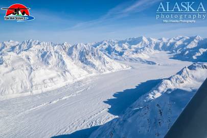 Fan Glacier as it passes between the mountains.