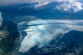 Looking down on Knik Glacier, and the Knik River from a commercial flight.