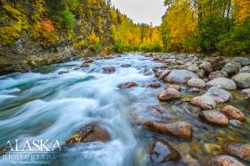 Little Susitna River as it flows down out of the mountains before entering the valley.