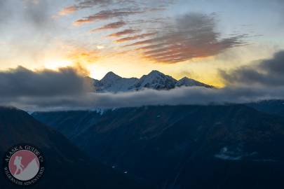 Sunrise behind Mount Bonet and East Peak from Glacier Lookout.