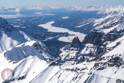 Joshua Green Peak (left) and Nikolai Butte (center-right) down to Dan Creek on the valley floor.