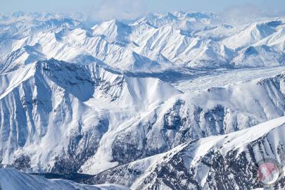 The north and east faces of Porphyry Mountain with Kennicott Glacier in the background (right).