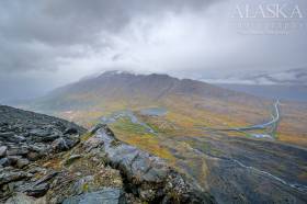 Looking across Thompson Pass at Odessey as it rises into the clouds.