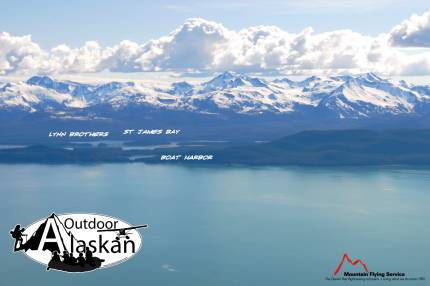 Looking west across Lynn Canal, at Boat Harbor, St James Bay, and Lynn Brothers, and in the background the southern end of the Chilkat Range.