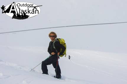 A Candian from lower BC drove down from Whitehorse just to board Glave Peak. Haines local Jason Allgood hikes up behind him in the distance. Down on the highway those little specks which are trucks.