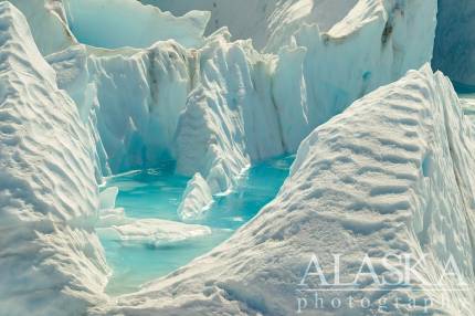 Little pools of melted glacier water hold bright colors.