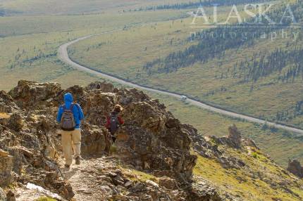 Hikers move along the ridge of Savage Alpine Trail.